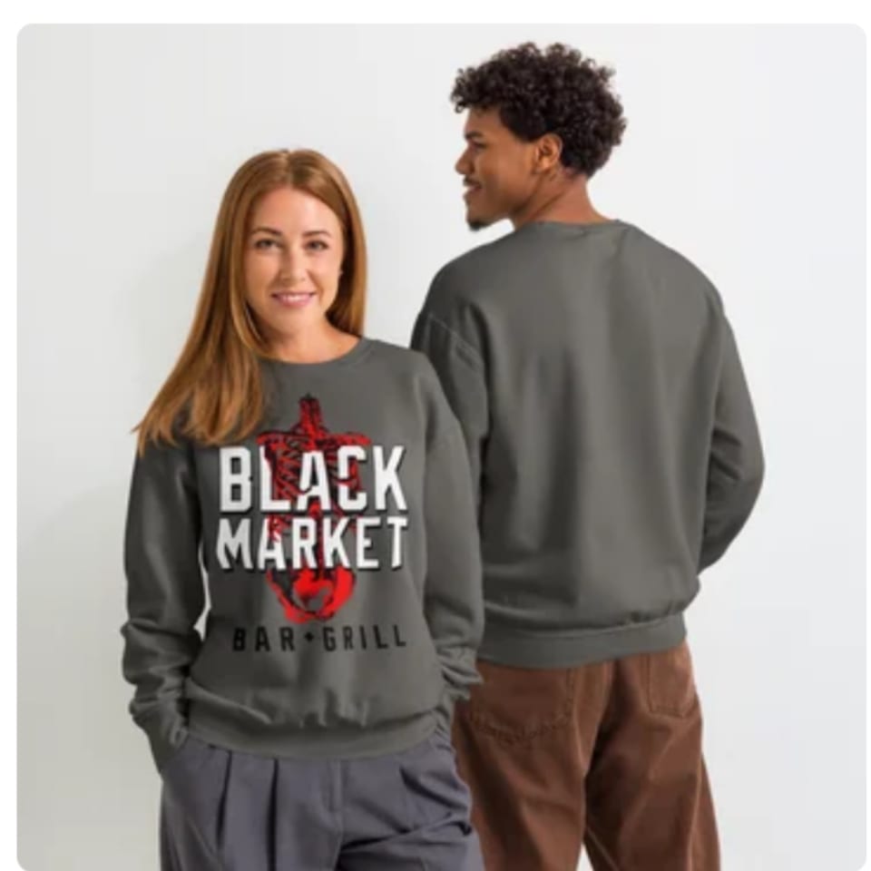 Two people wearing gray Black Market Bar + Grill sweatshirts, one facing forward, one facing away.